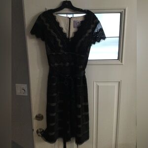 JS Collection.   Black cocktail dress.  Knee length, lace overlay